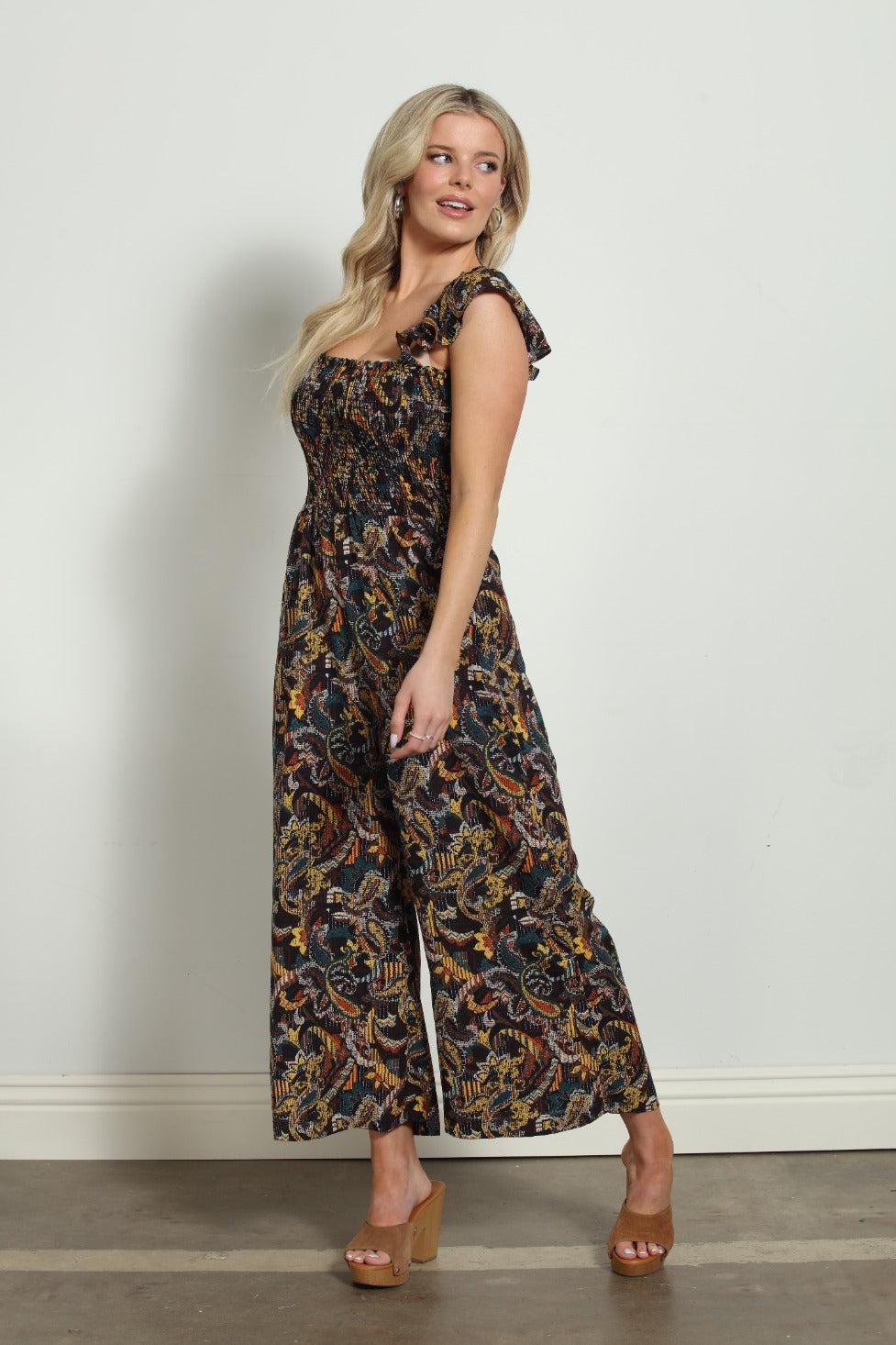 woman in multicolored sleeveless jumpsuit