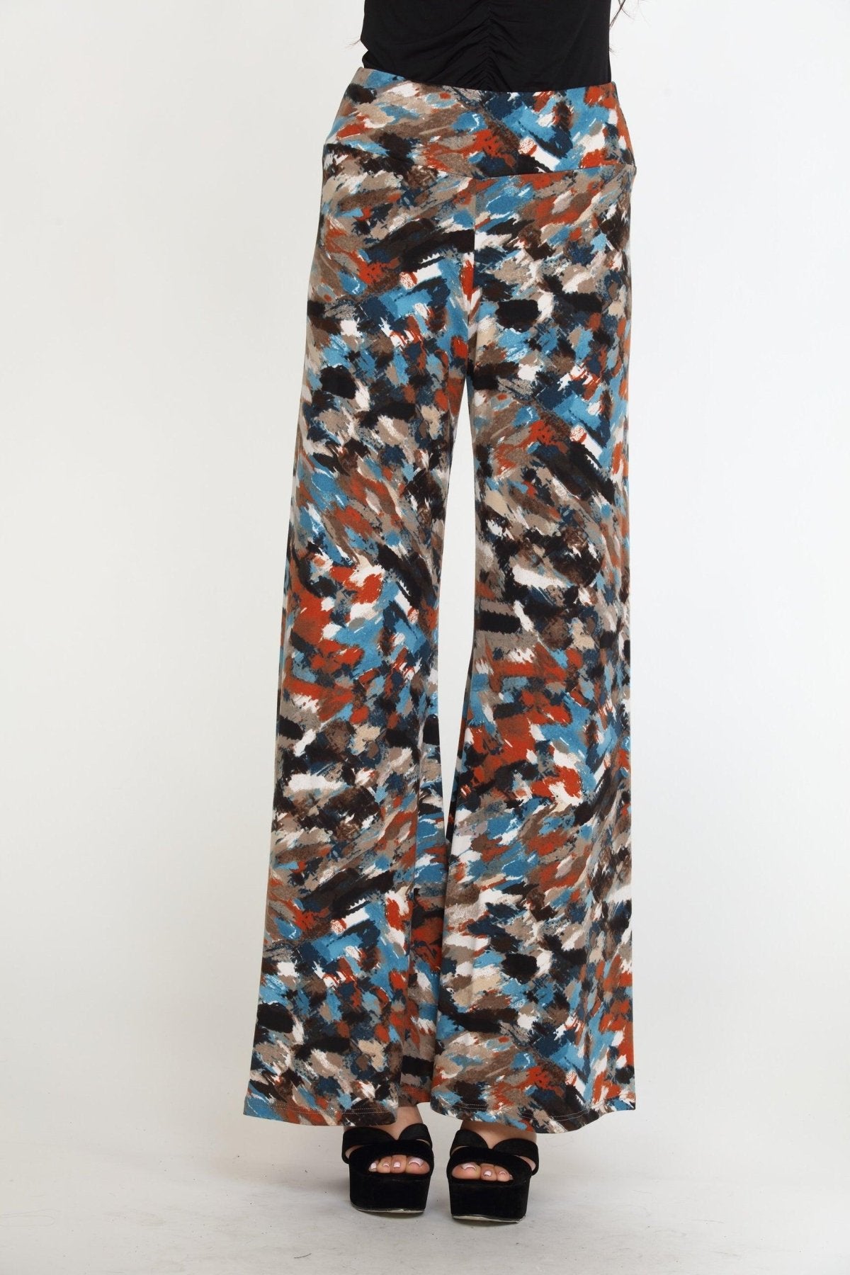 multicolored wideleg pants on woman in black heels and black long sleeve top