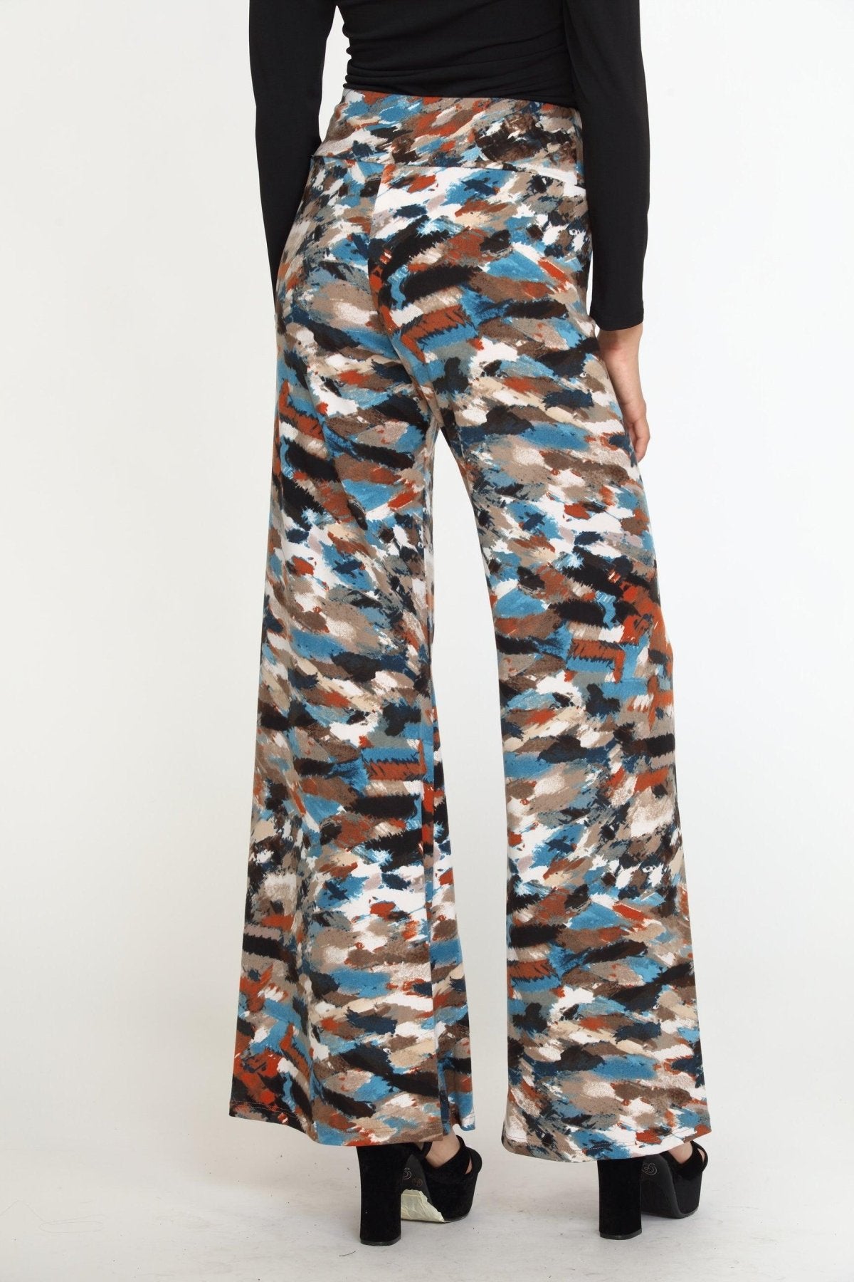 back side of multicolored wideleg pants on woman