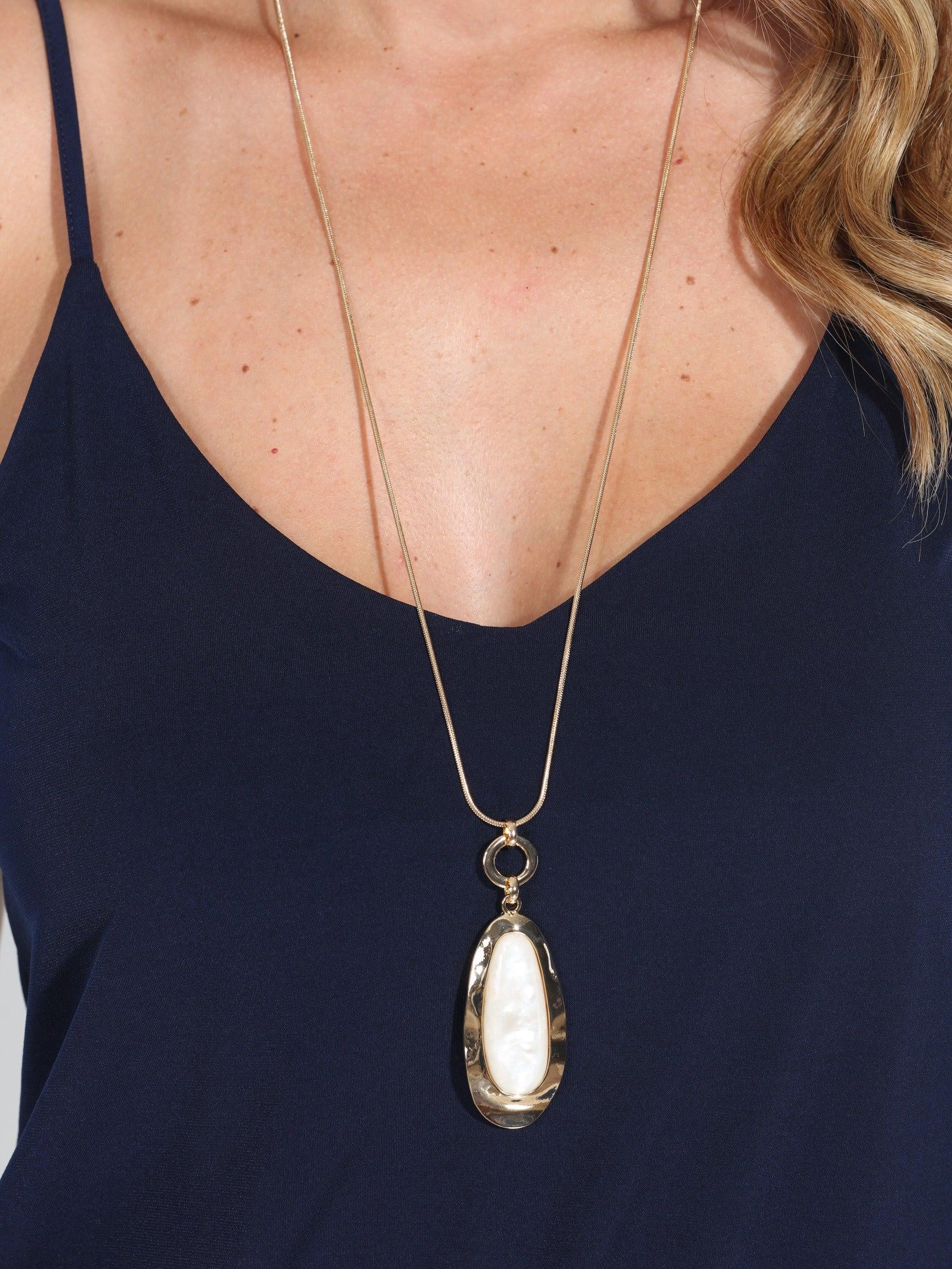 Gold and Pearlescent Pendant Necklace