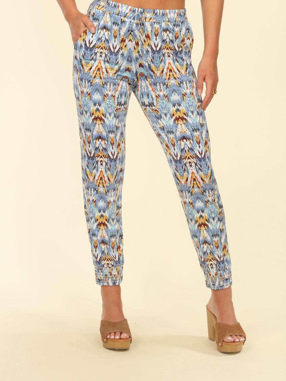 multicolored pants on woman in platform heels