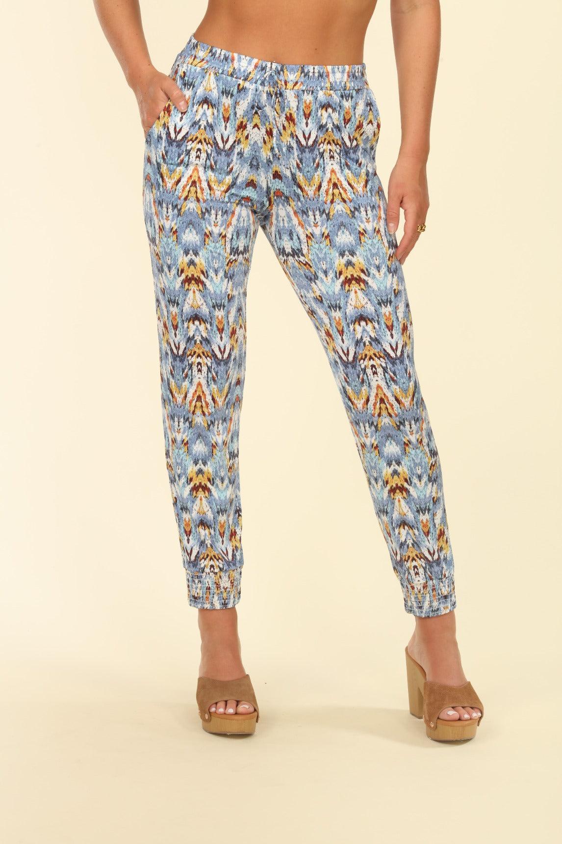 multicolored pants on woman in platform heels