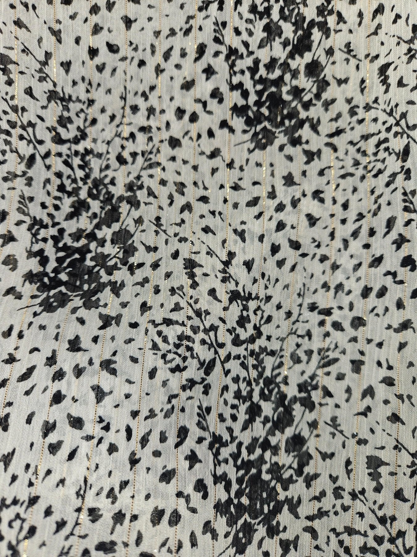 white and black printed fabric