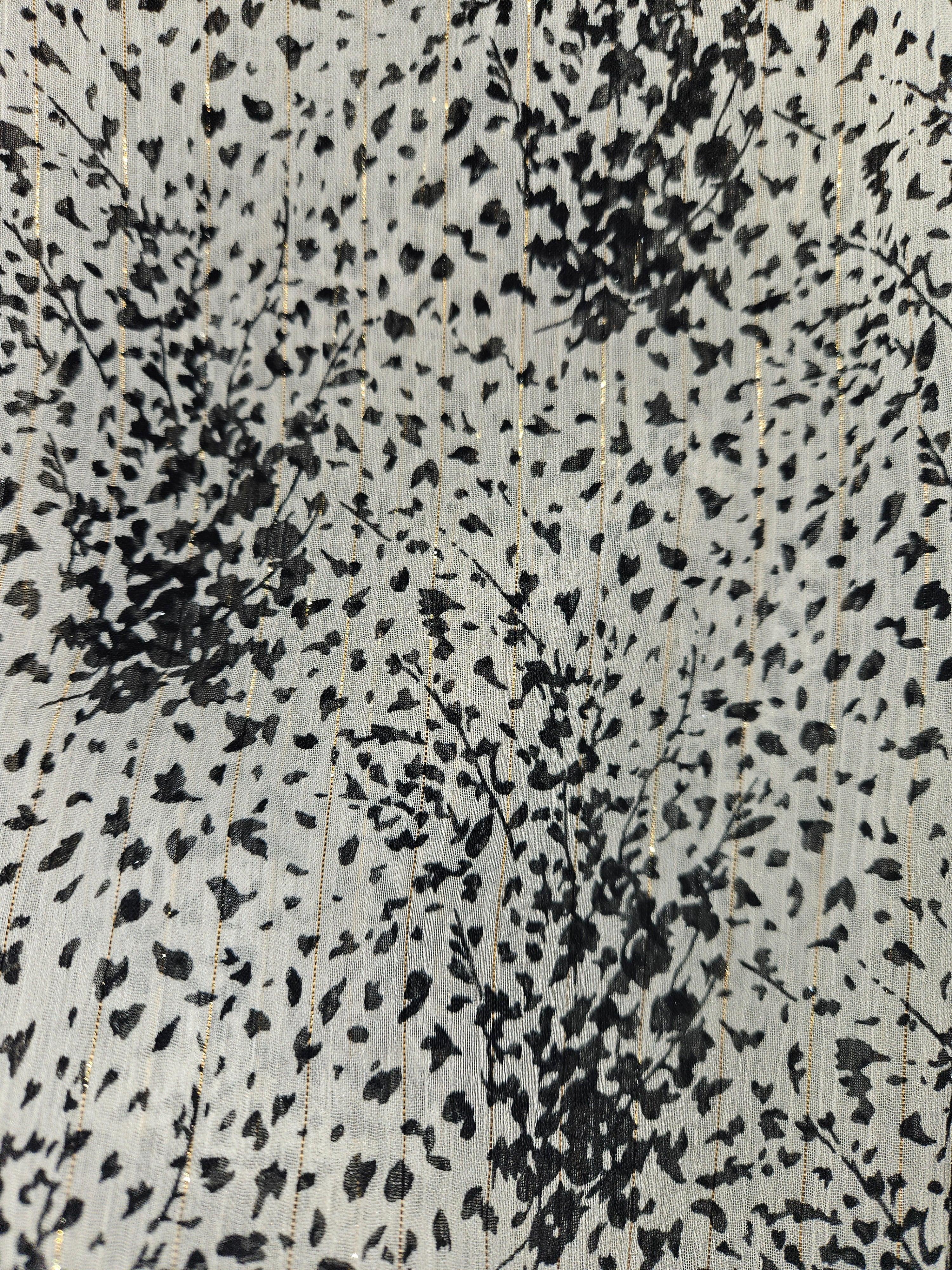 white and black printed fabric