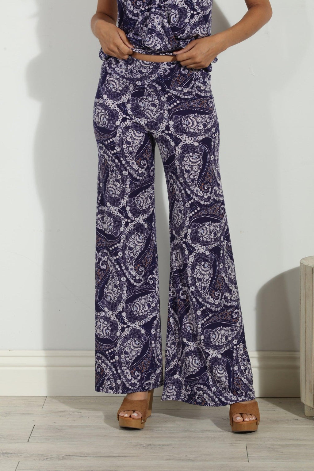 blue and white paisley wide leg pants on body