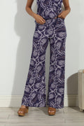 blue and white paisley wide leg pants on body