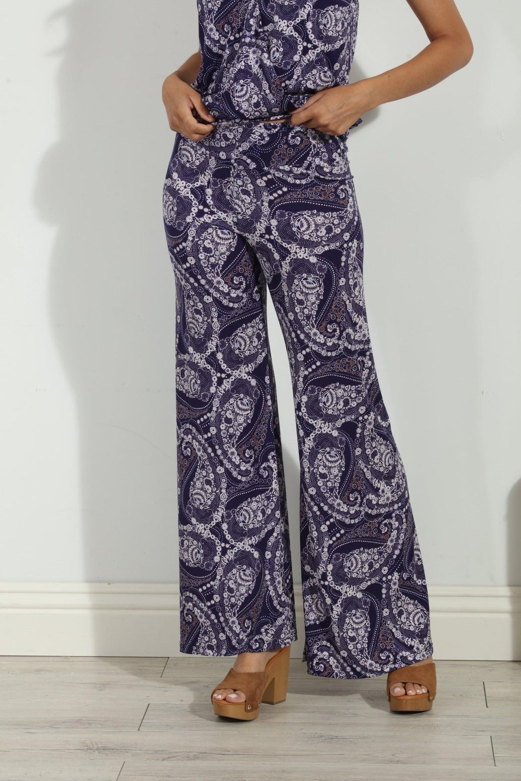 blue and white paisley wide leg pants on body