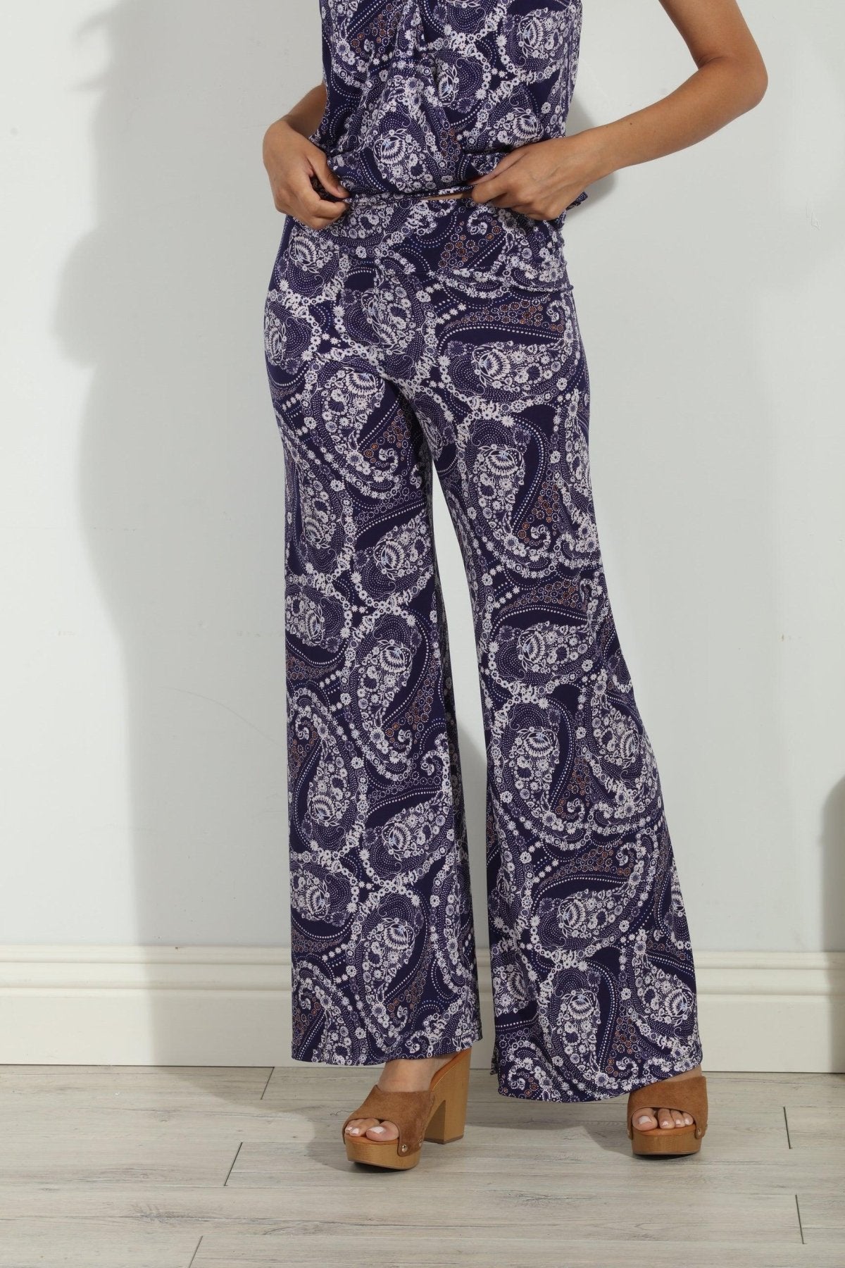 blue and white paisley wide leg pants on body