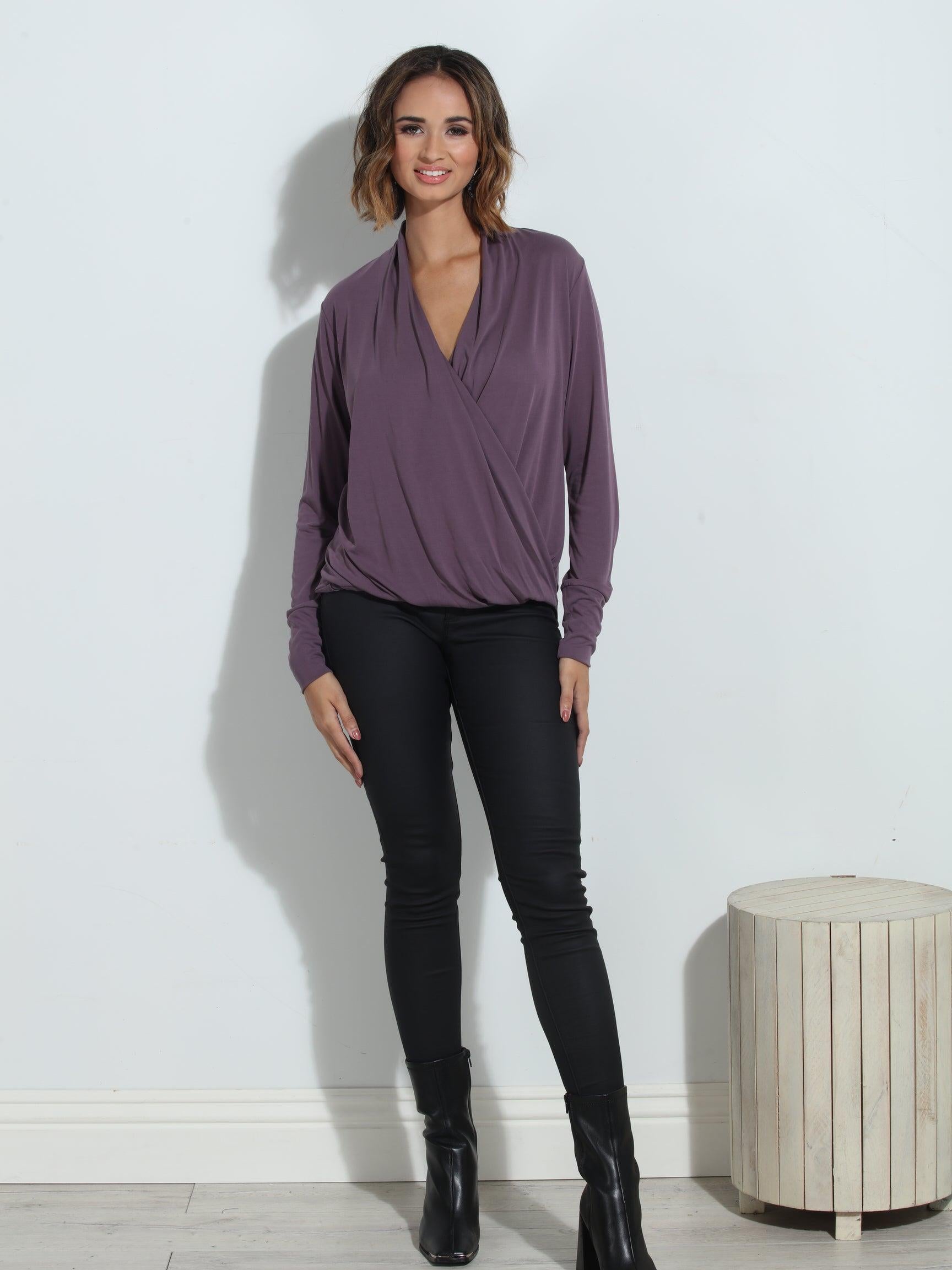 purple long sleeve blouse on woman in black pants and black boots
