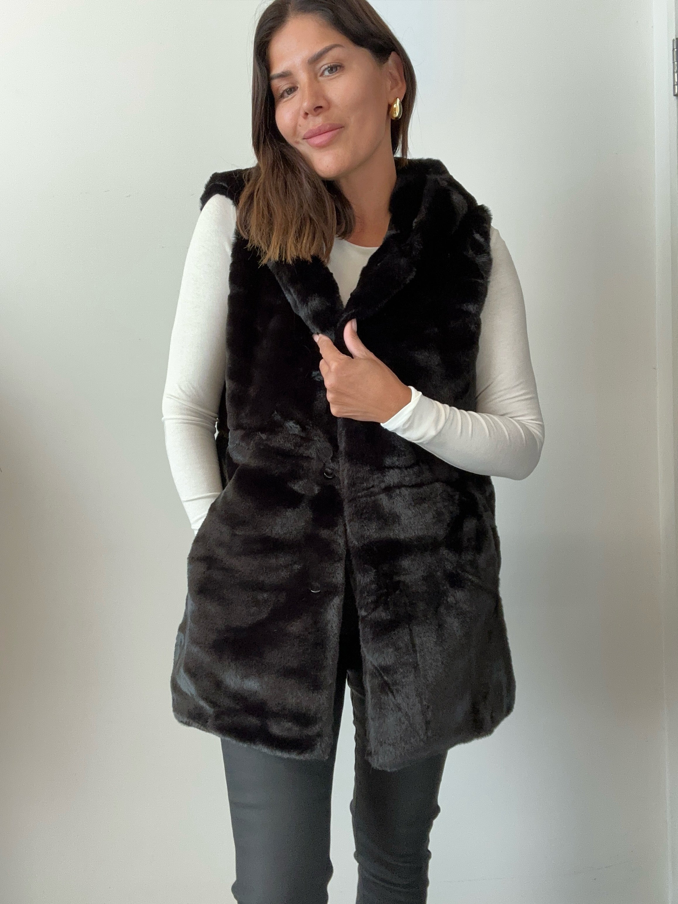 Black fuzzy shop vest womens