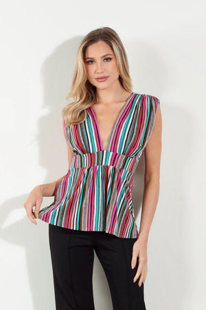 woman in multicolored sleeveless blouse and black pants