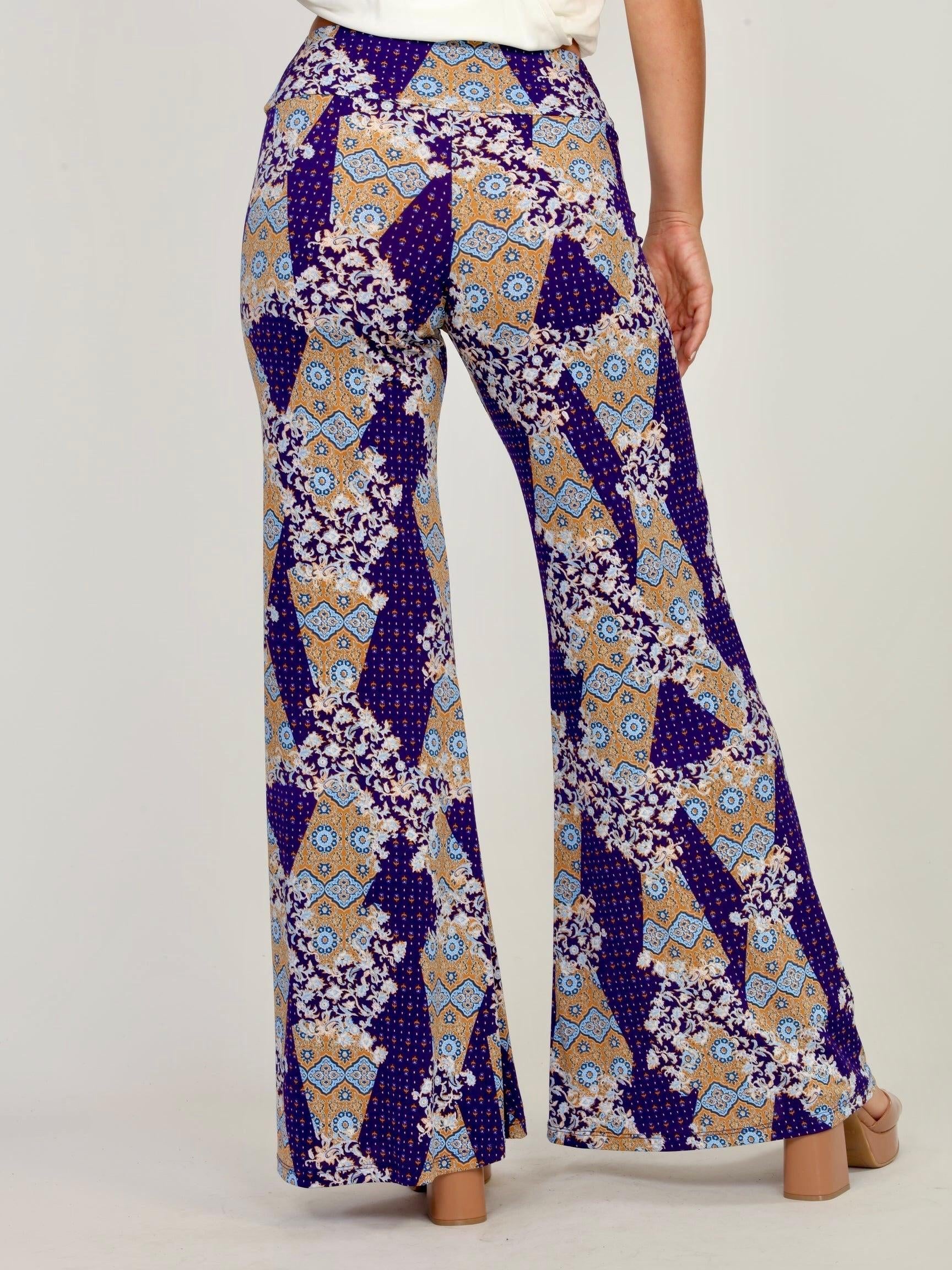 back side of multicolored, printed, wide-legged pants on woman