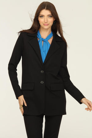 black blazer and blue top on woman