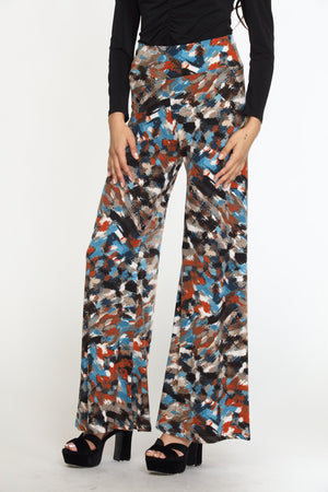multicolored wideleg pants on woman in black heels and black long sleeve top