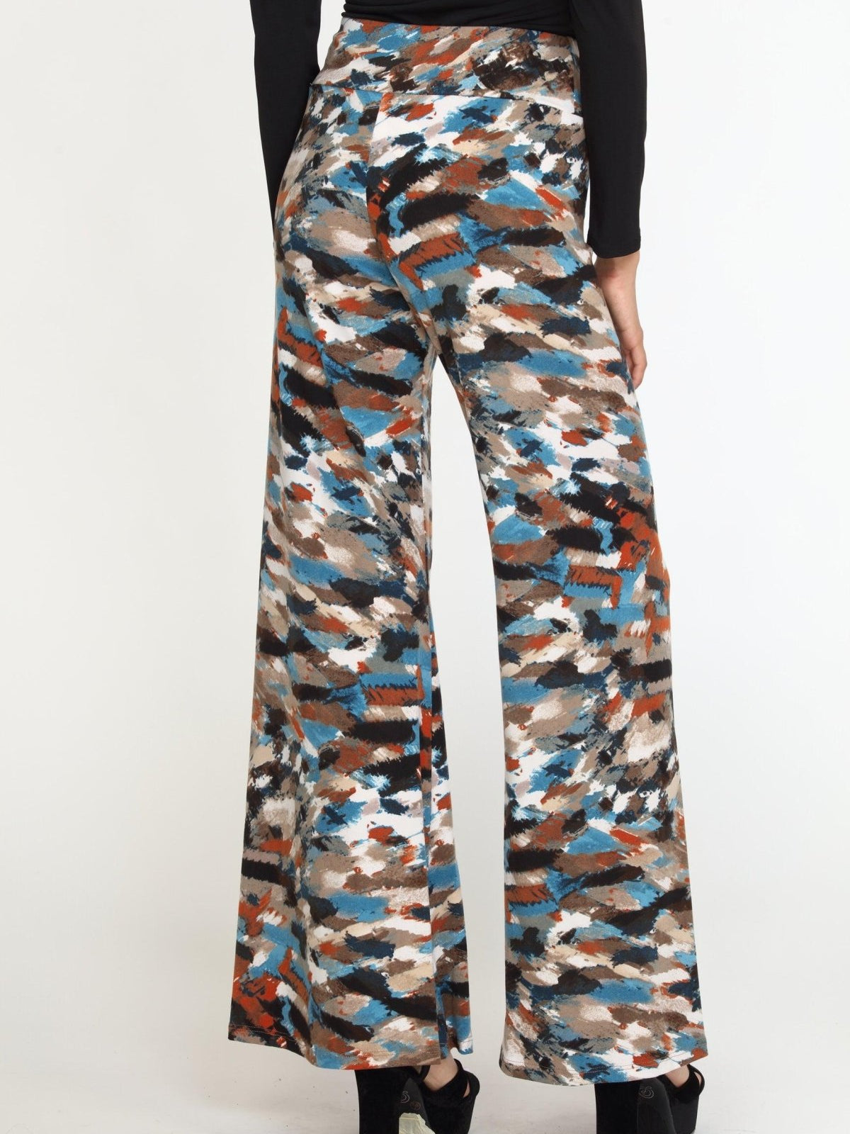 back side of multicolored wideleg pants on woman