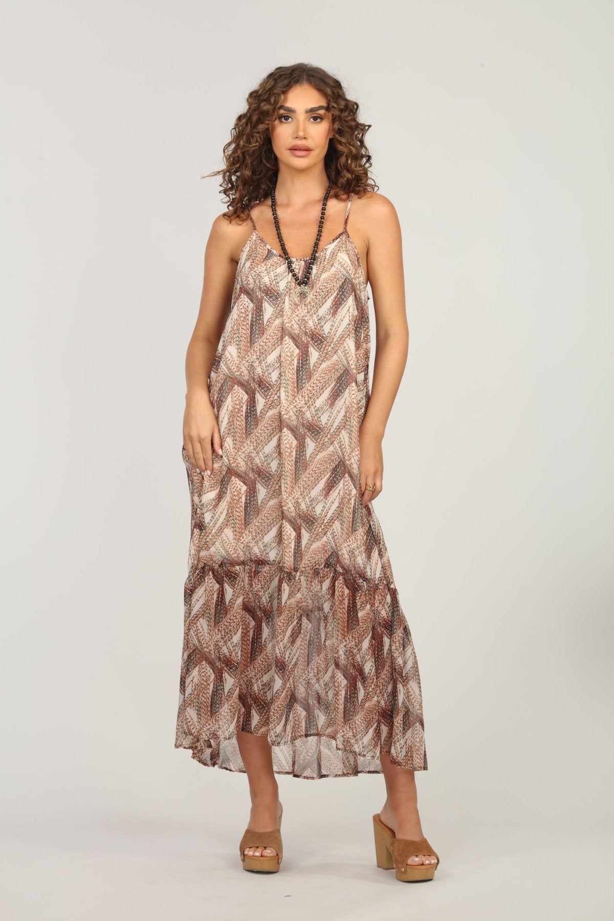 sleeveless multicolored maxi dress on woman