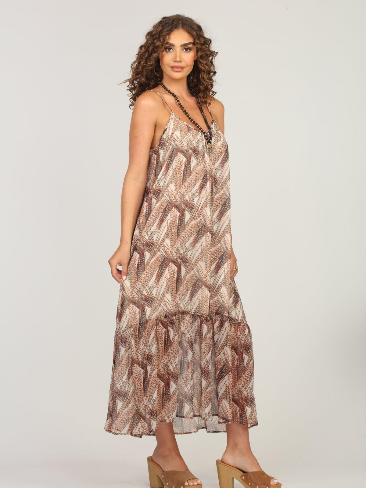 sleeveless multicolored maxi dress on woman