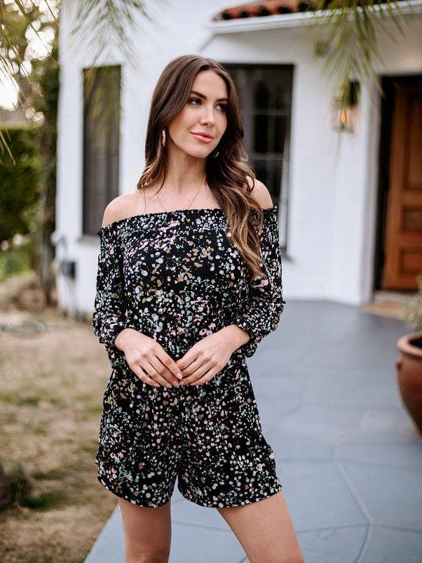 multicolored off the shoulder romper on woman